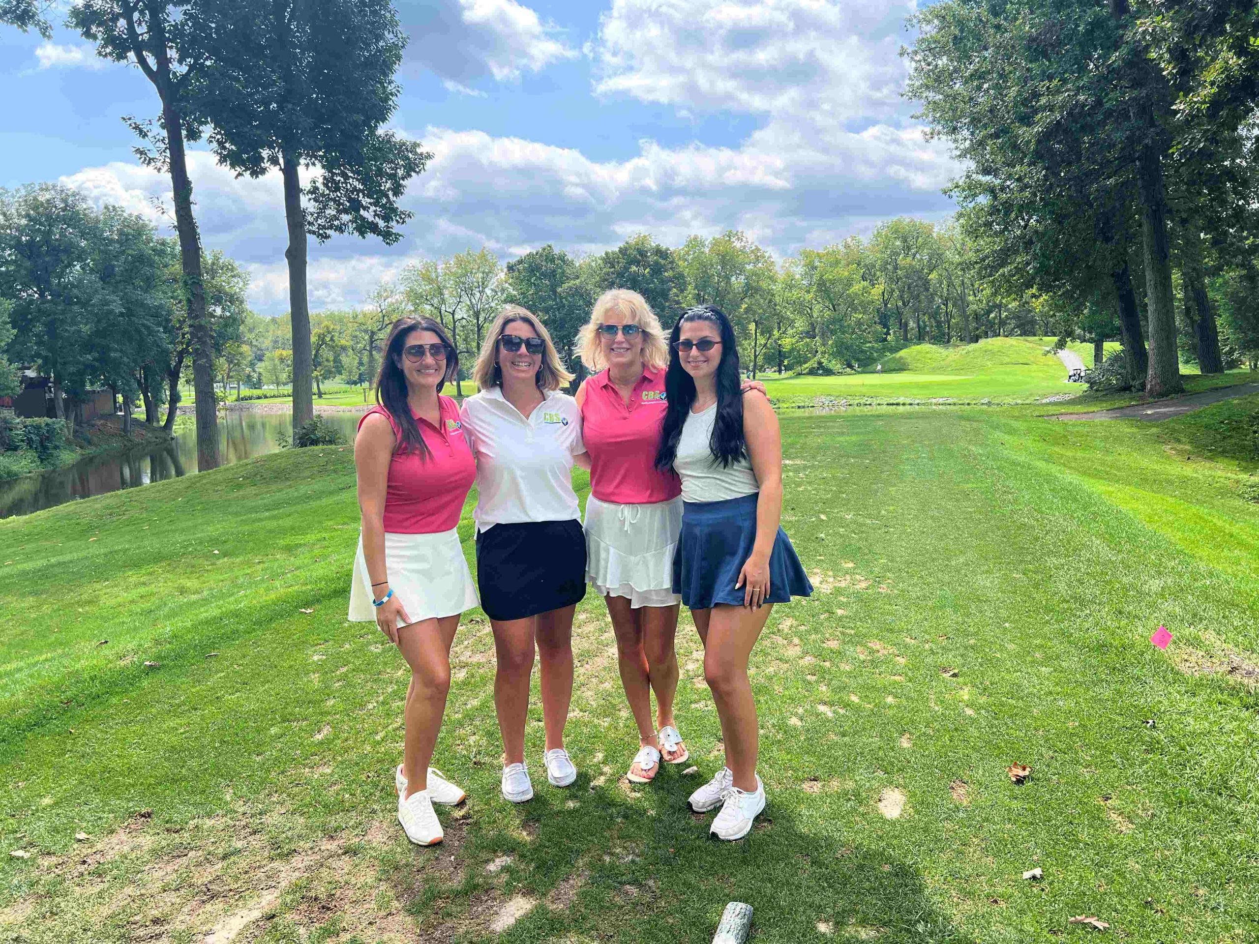 women on a golf course